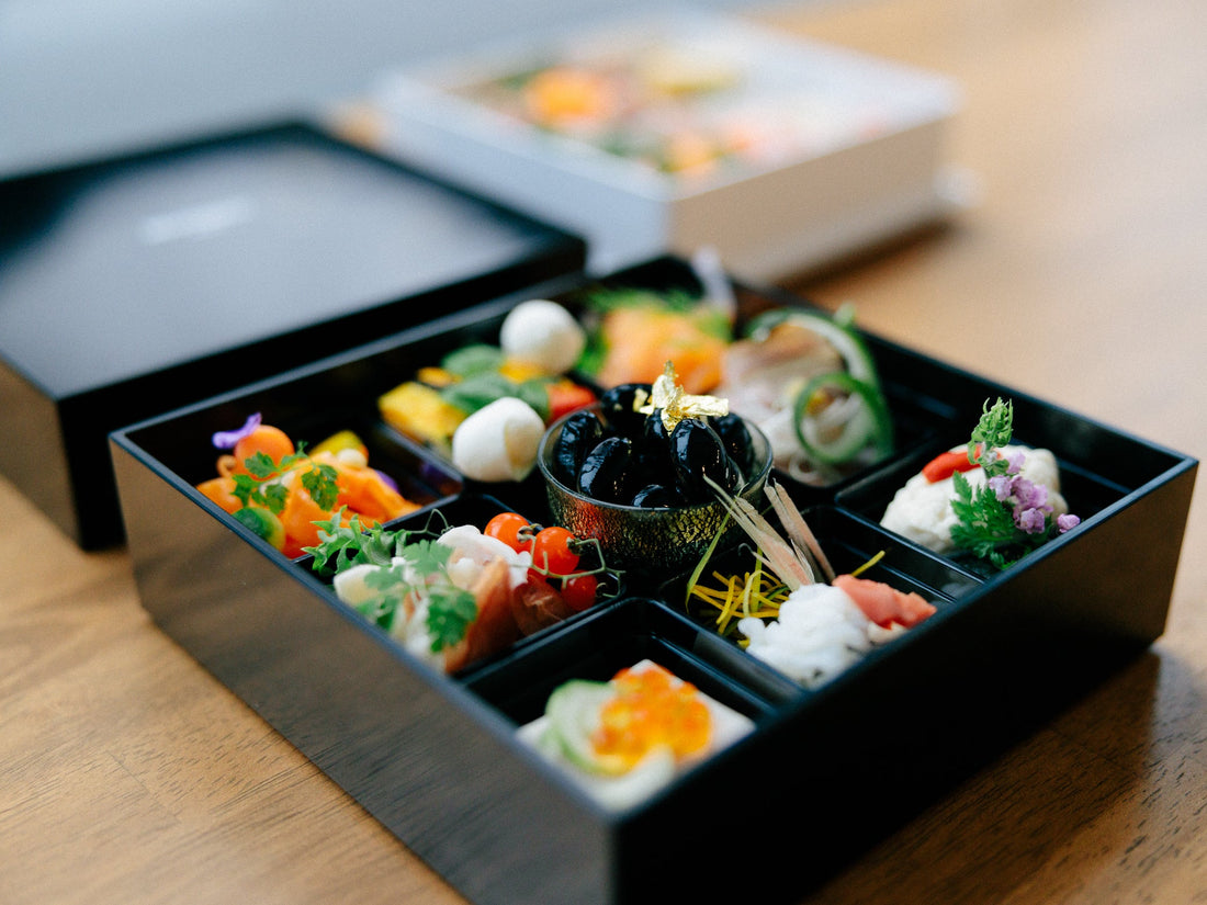 Un repas washoku préparé par un chef de Kyoto dans notre bento pique-nique Signature