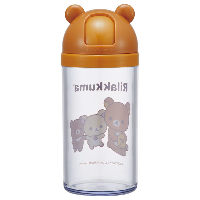 Clear furikake case with bear-shaped orange lid featuring Rilakkuma characters on a white background